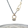 Diamond pendant set in yellow gold